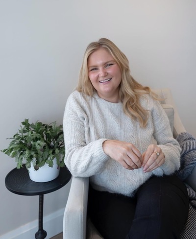 Smiling headshot of Megan Appleton, psychotherapist with Tiny Therapy Collective